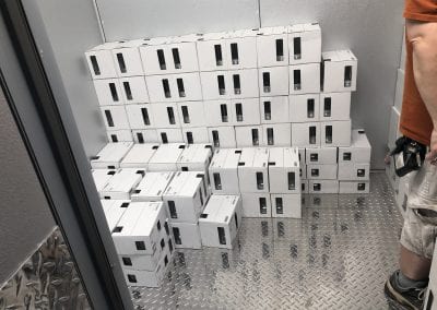 A room filled with lots of boxes stacked on top of each other.